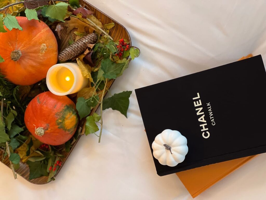 Chanel book with autumn decoration on the sheets. Celebration of Thanksgiving in Paris at Hôtel des 2 Continents.